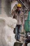 Dave Hailstone with a carved angle on Newport Minster